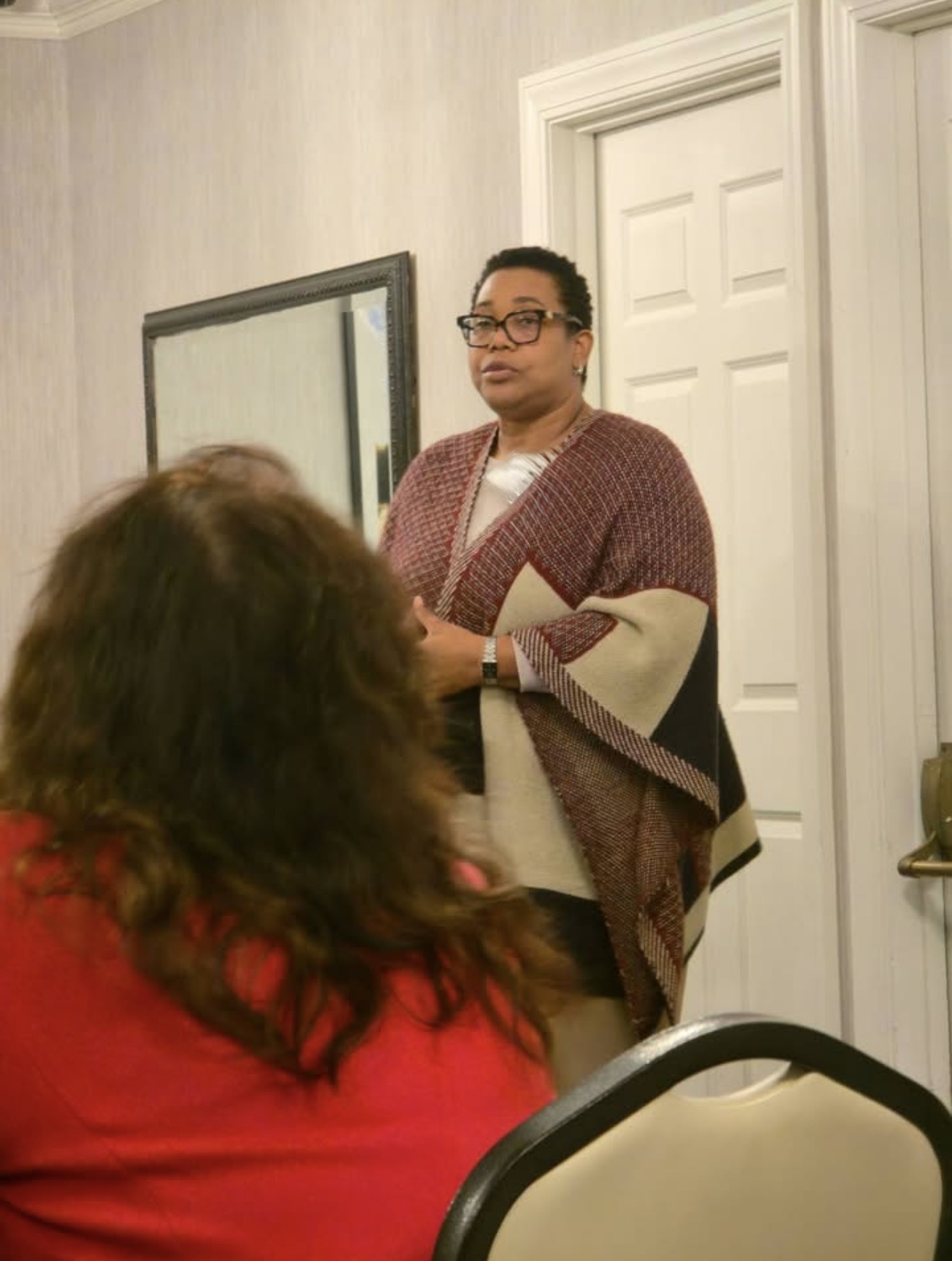 Gayon Buchanan speaking with participants during a dementia caregiver support group meeting